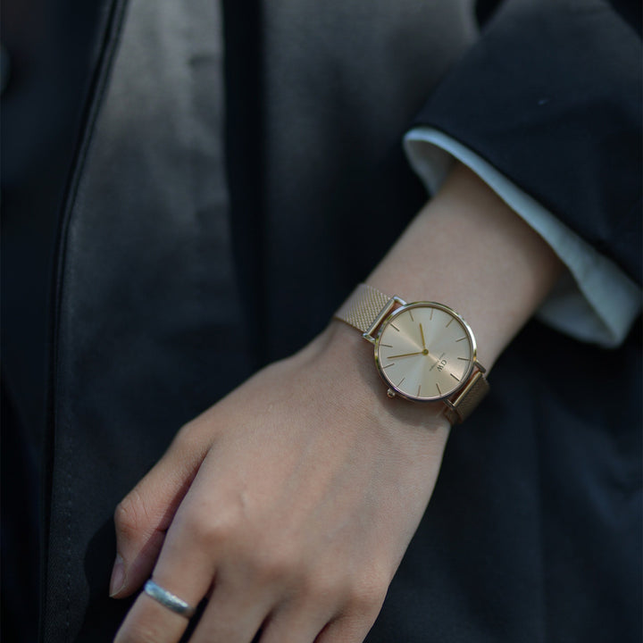 Daniel Wellington Petite Unitone 28 Gold Watch